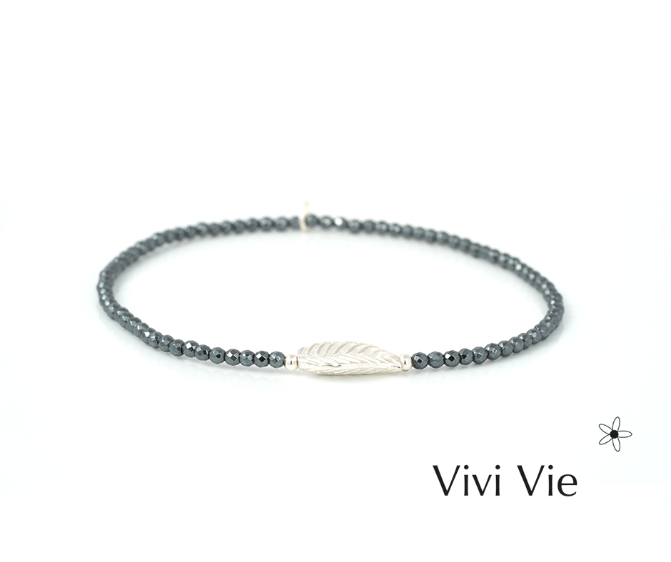 Delicate hematite and silver leaf braclet with meaning.