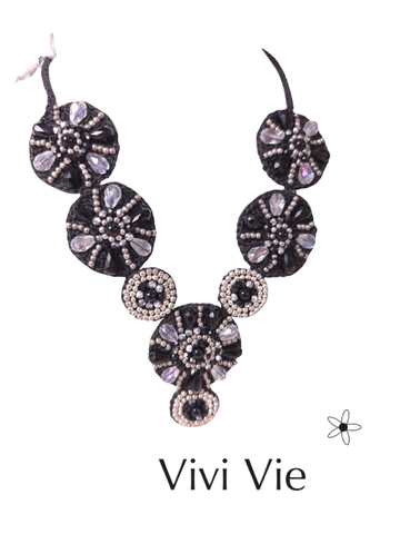 A captivating statment necklace  making a striking impression.