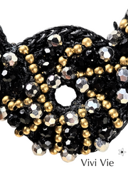 A statment necklace with lusturious circular  elegance .