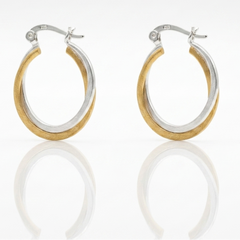 Sleak Dual-Tone Hoop Earring Elgance.