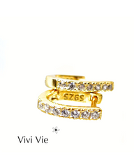 Gold earings with cubic zirconia.
