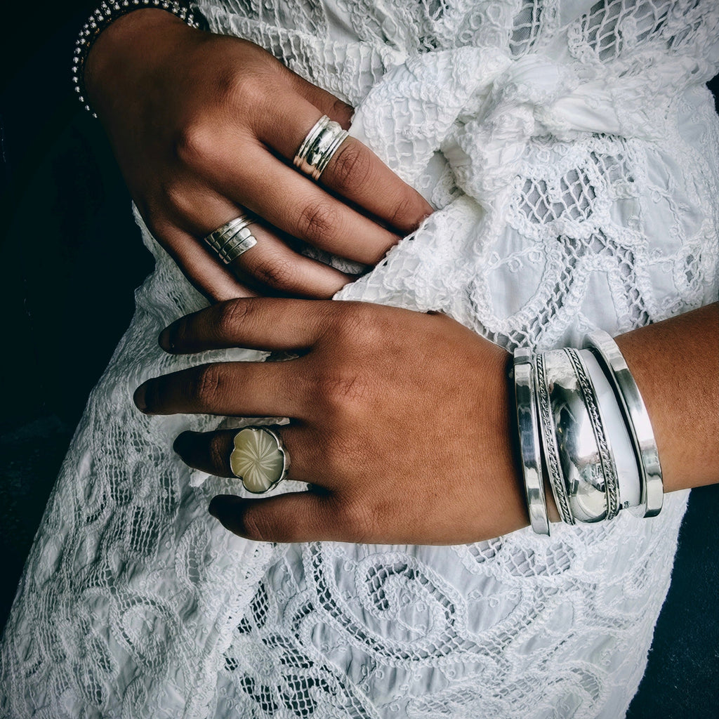 Seashell with flower ring.