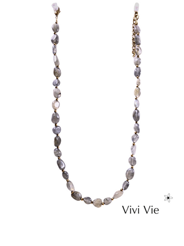 Shimmering labrodite with gold accent. The stone of transformation .