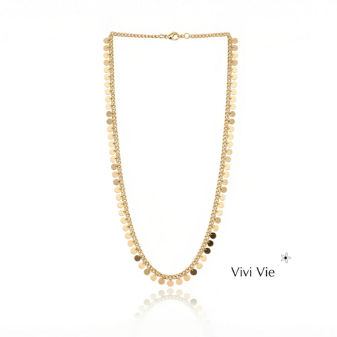 The gold Selena  disk chain necklace.