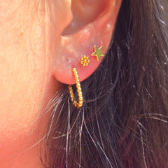 Gold   Star Stud Earrings that  shine bright.