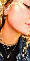 A whisper of natures beauty with a gold dragonfly necklace