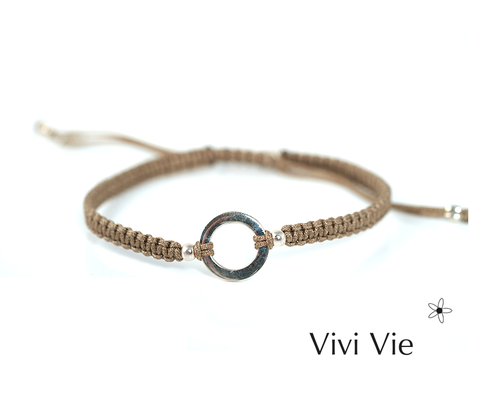 Silver  karma  circle for frienship braclet in a mocka colour.