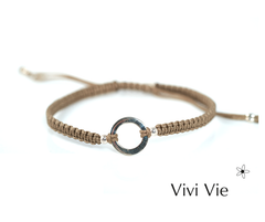 Silver  karma  circle for frienship braclet in a mocka colour.