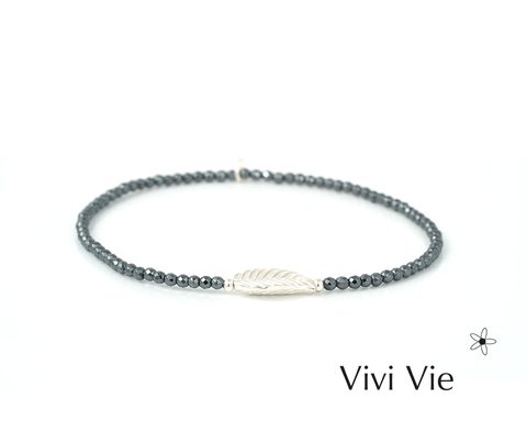 Delicate hematite  and silver leaf braclet with meaning.