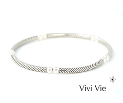Siver elegance with a urban vibe so versitile create your style  with Vivi vie  tube and ball bracelets. .