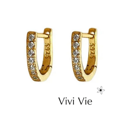 Gold earings with cubic zirconia.