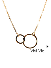 Minimalist intelocking gold double  circle necklace.The two inerlocking circles