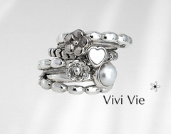 Silver rice bead ring wear  for stacking or alone for a minimalist  statment.