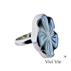 Seashell with flower ring.