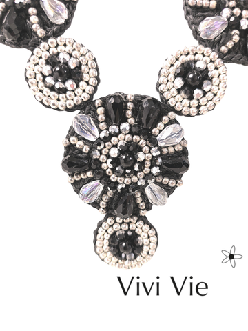 A captivating statment necklace  making a striking impression.