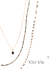 Black onyx and gold layering duo.