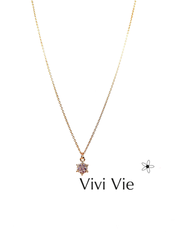 A gold  Star necklace  that sparlels bright