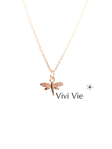 A whisper of natures beauty with a gold dragonfly necklace